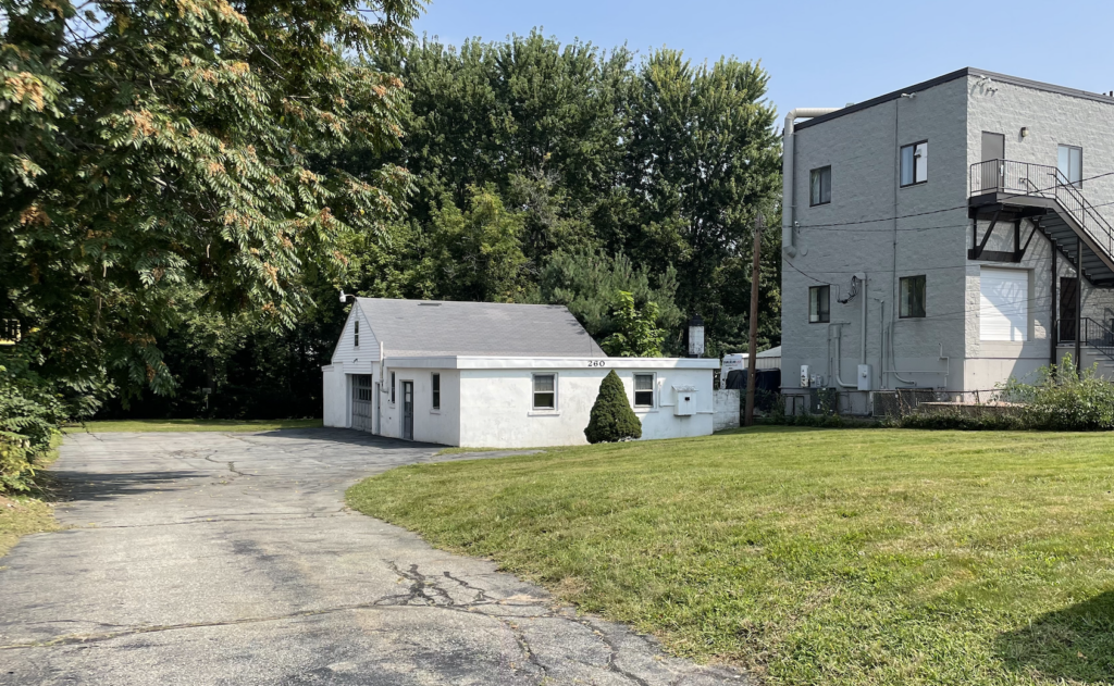 260 Calvary Street, Waltham, MA 02453. Warehouse and office space with garage bay. Listed and sold by Gelineau & Associates R.E.